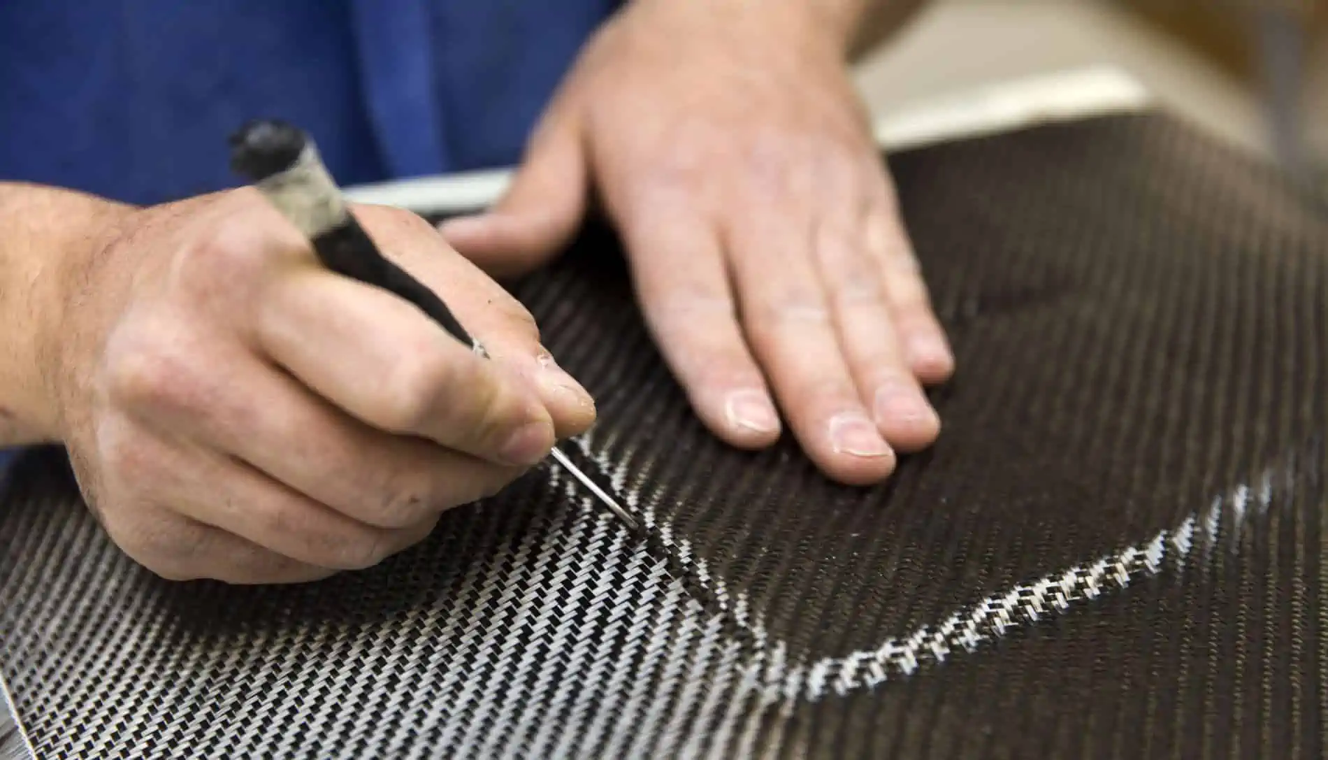 Incorporation of carbon fiber fabric into a negative mold
